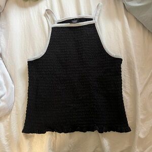 Black ribbed crop top with ruffle trim